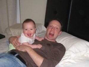 Daddy and Ryan practice smiling.