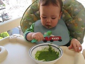 Ryan tries to feed himself