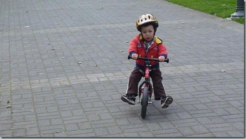 Ryan and his red walking bike