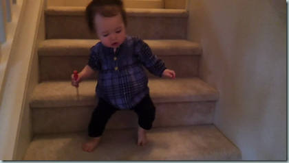 Madeline learns to go down the stairs